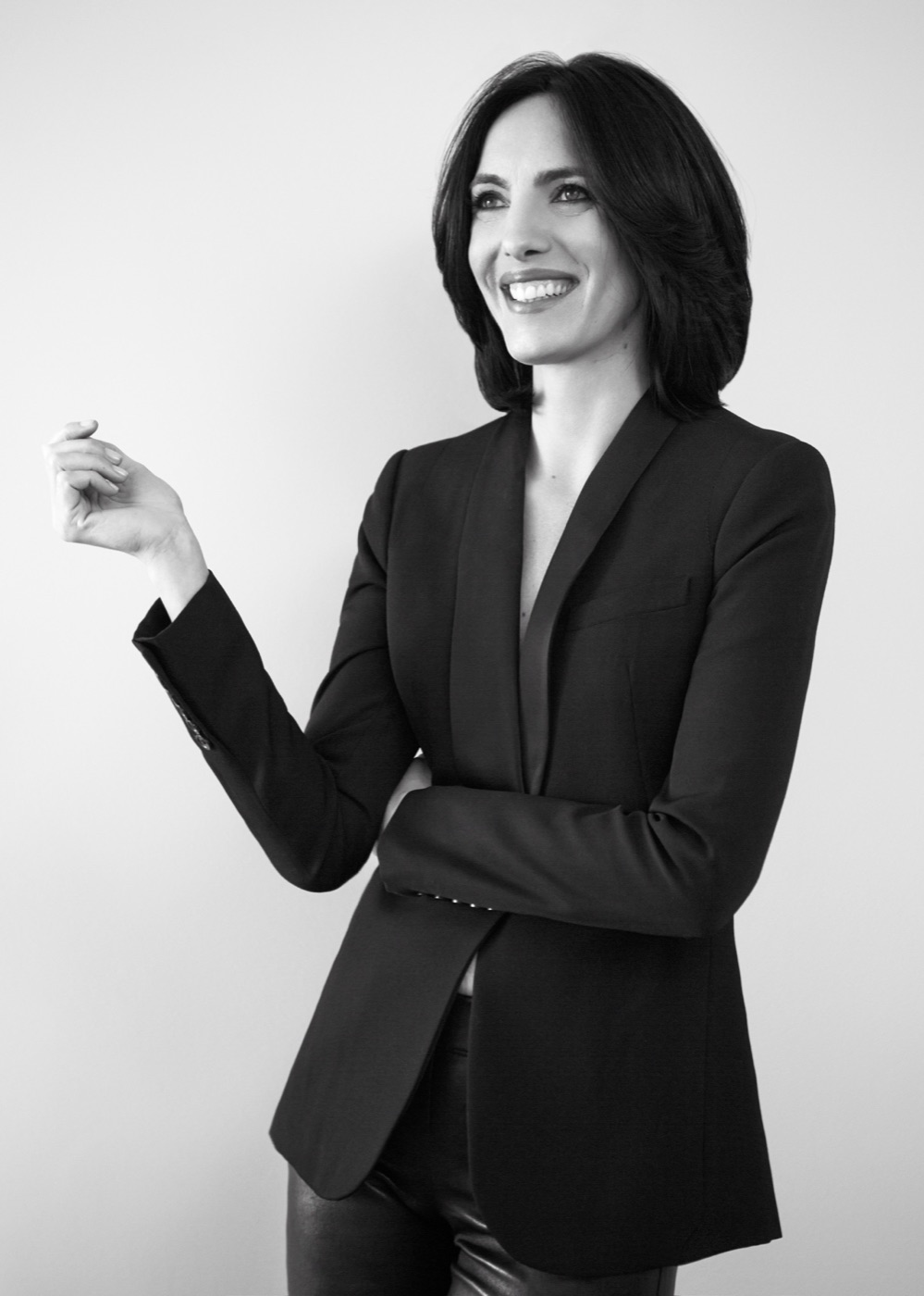 Giulia Maresca in a black suit